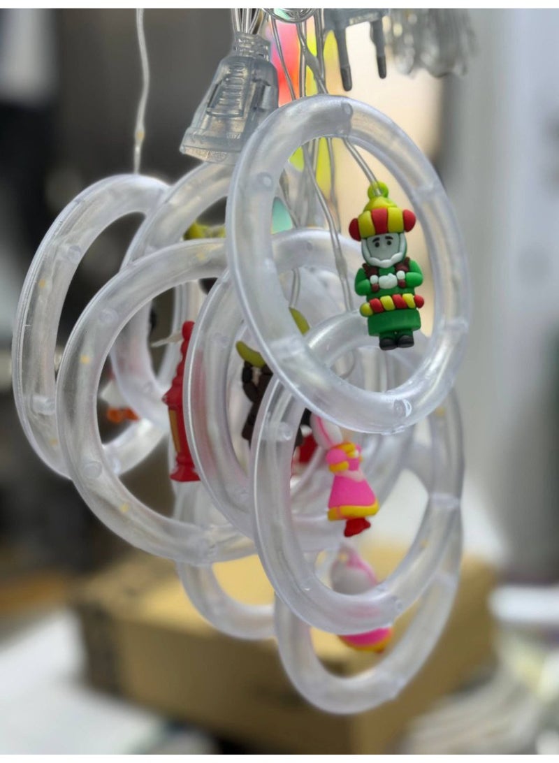 ستارة كُور مضيئة بلمبات شفافة وشخصيات رمضان، بإضاءة وورم صفراء دافئة ✨ طول الستارة 3.5 متر، مزودة بلمبات بيبي وورم—مثالية لتزيين البيت أو البلكونة ولمسة رمضانية تخطف القلب. - Image 1